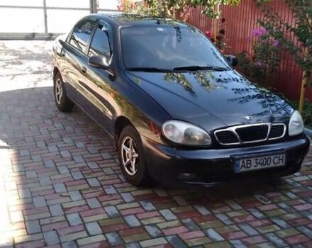 Черный Дэу Ланос, объемом двигателя 1.5 л и пробегом 156 тыс. км за 2000 $, фото 6 на Automoto.ua