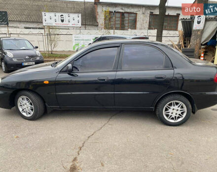 Черный Дэу Ланос, объемом двигателя 1.5 л и пробегом 231 тыс. км за 2900 $, фото 1 на Automoto.ua