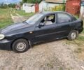Черный Дэу Ланос, объемом двигателя 1.5 л и пробегом 300 тыс. км за 1900 $, фото 9 на Automoto.ua