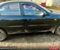 Черный Дэу Ланос, объемом двигателя 1.5 л и пробегом 140 тыс. км за 1100 $, фото 1 на Automoto.ua