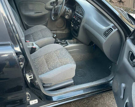 Чорний Деу Ланос, об'ємом двигуна 1.5 л та пробігом 100 тис. км за 3000 $, фото 8 на Automoto.ua