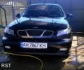 Чорний Деу Ланос, об'ємом двигуна 1.5 л та пробігом 182 тис. км за 3000 $, фото 1 на Automoto.ua