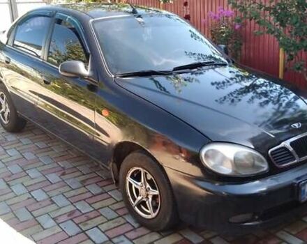 Черный Дэу Ланос, объемом двигателя 1.5 л и пробегом 156 тыс. км за 2000 $, фото 4 на Automoto.ua