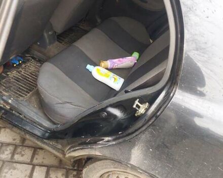 Чорний Деу Ланос, об'ємом двигуна 1.39 л та пробігом 320 тис. км за 1500 $, фото 4 на Automoto.ua