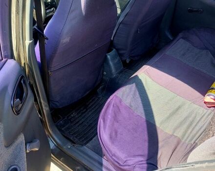 Черный Дэу Ланос, объемом двигателя 1.5 л и пробегом 217 тыс. км за 1800 $, фото 3 на Automoto.ua