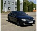 Черный Дэу Ланос, объемом двигателя 1.5 л и пробегом 255 тыс. км за 2800 $, фото 1 на Automoto.ua