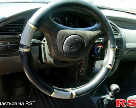 Черный Дэу Ланос, объемом двигателя 1.6 л и пробегом 104 тыс. км за 3000 $, фото 6 на Automoto.ua