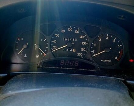 Черный Дэу Ланос, объемом двигателя 1.5 л и пробегом 365 тыс. км за 2000 $, фото 5 на Automoto.ua