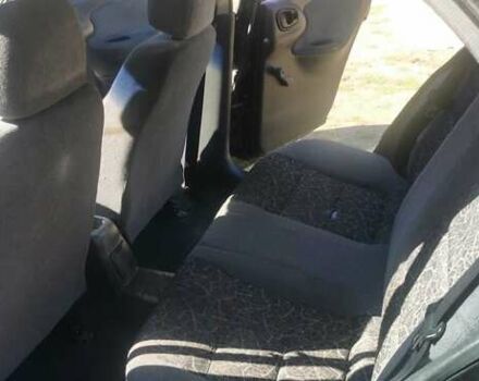 Черный Дэу Ланос, объемом двигателя 1.3 л и пробегом 160 тыс. км за 2000 $, фото 16 на Automoto.ua