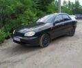 Черный Дэу Ланос, объемом двигателя 1.5 л и пробегом 250 тыс. км за 2850 $, фото 1 на Automoto.ua
