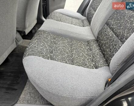 Черный Дэу Ланос, объемом двигателя 1.5 л и пробегом 128 тыс. км за 2999 $, фото 44 на Automoto.ua