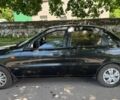 Черный Дэу Ланос, объемом двигателя 1.5 л и пробегом 210 тыс. км за 2800 $, фото 1 на Automoto.ua