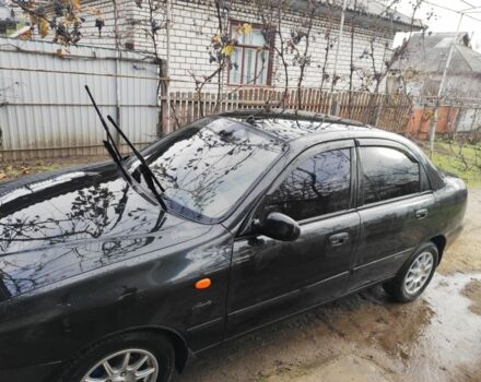 Черный Дэу Ланос, объемом двигателя 1.5 л и пробегом 130 тыс. км за 2700 $, фото 1 на Automoto.ua