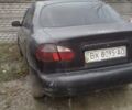 Черный Дэу Ланос, объемом двигателя 1.5 л и пробегом 160 тыс. км за 540 $, фото 1 на Automoto.ua