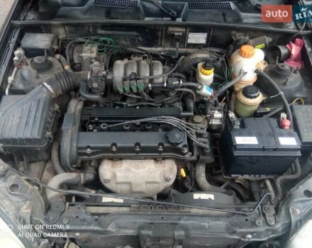 Чорний Деу Ланос, об'ємом двигуна 1.6 л та пробігом 230 тис. км за 1750 $, фото 1 на Automoto.ua