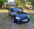 Чорний Деу Ланос, об'ємом двигуна 1.6 л та пробігом 215 тис. км за 2552 $, фото 1 на Automoto.ua