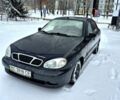 Черный Дэу Ланос, объемом двигателя 1.5 л и пробегом 220 тыс. км за 2400 $, фото 1 на Automoto.ua