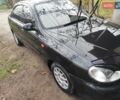 Черный Дэу Ланос, объемом двигателя 1.5 л и пробегом 130 тыс. км за 2700 $, фото 2 на Automoto.ua