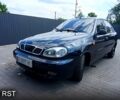 Черный Дэу Ланос, объемом двигателя 1.6 л и пробегом 300 тыс. км за 2800 $, фото 1 на Automoto.ua