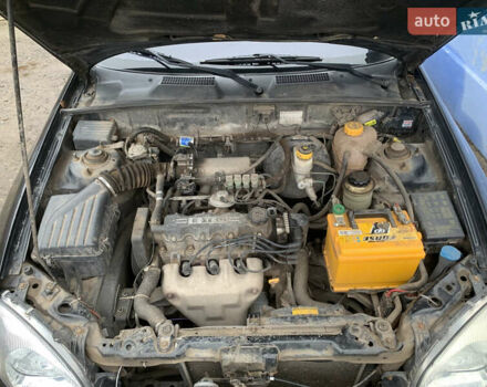 Черный Дэу Ланос, объемом двигателя 1.5 л и пробегом 119 тыс. км за 2700 $, фото 3 на Automoto.ua