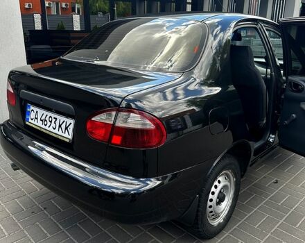 Черный Дэу Ланос, объемом двигателя 1.6 л и пробегом 120 тыс. км за 3000 $, фото 2 на Automoto.ua