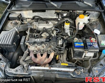 Деу Ланос 2008 у Вышгороде на Automoto.ua Чорний Деу Ланос, об'ємом двигуна 1.5 л та пробігом 210 тис. км за 1900 $, фото 8 на Automoto.ua