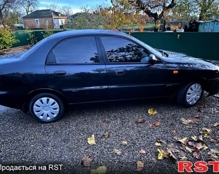 Черный Дэу Ланос, объемом двигателя 1.4 л и пробегом 220 тыс. км за 1800 $, фото 6 на Automoto.ua