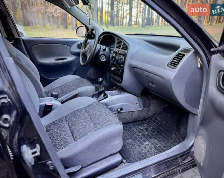 Черный Дэу Ланос, объемом двигателя 1.5 л и пробегом 97 тыс. км за 2850 $, фото 2 на Automoto.ua