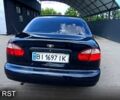 Черный Дэу Ланос, объемом двигателя 1.6 л и пробегом 300 тыс. км за 2800 $, фото 4 на Automoto.ua