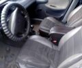 Черный Дэу Ланос, объемом двигателя 1.4 л и пробегом 230 тыс. км за 2800 $, фото 2 на Automoto.ua