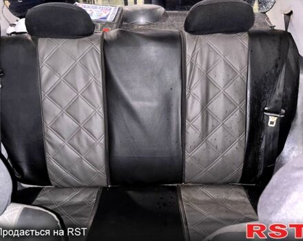 Черный Дэу Ланос, объемом двигателя 1.5 л и пробегом 292 тыс. км за 2300 $, фото 7 на Automoto.ua