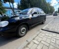 Черный Дэу Ланос, объемом двигателя 1.4 л и пробегом 220 тыс. км за 2400 $, фото 1 на Automoto.ua