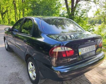 Черный Дэу Ланос, объемом двигателя 1.4 л и пробегом 165 тыс. км за 1450 $, фото 4 на Automoto.ua
