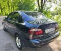 Черный Дэу Ланос, объемом двигателя 1.4 л и пробегом 165 тыс. км за 1450 $, фото 4 на Automoto.ua