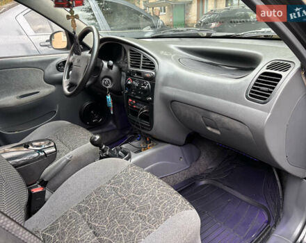 Черный Дэу Ланос, объемом двигателя 1.6 л и пробегом 270 тыс. км за 2900 $, фото 23 на Automoto.ua