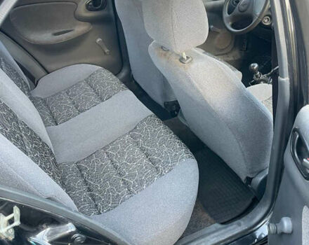 Чорний Деу Ланос, об'ємом двигуна 1.5 л та пробігом 100 тис. км за 3000 $, фото 9 на Automoto.ua