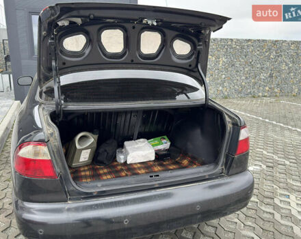 Чорний Деу Ланос, об'ємом двигуна 1.6 л та пробігом 40 тис. км за 3900 $, фото 3 на Automoto.ua