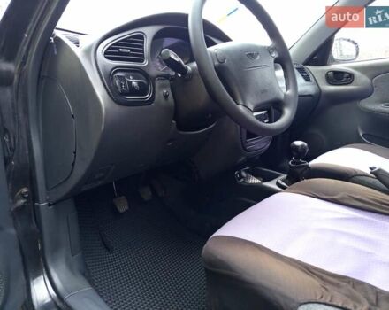 Черный Дэу Ланос, объемом двигателя 1.5 л и пробегом 180 тыс. км за 2300 $, фото 14 на Automoto.ua