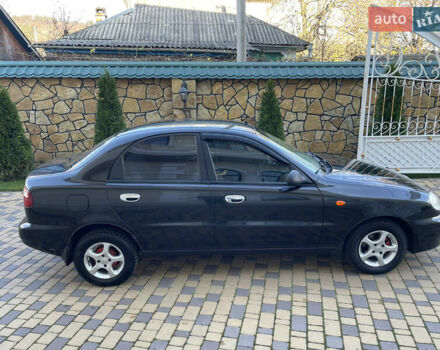 Черный Дэу Ланос, объемом двигателя 1.4 л и пробегом 233 тыс. км за 2500 $, фото 17 на Automoto.ua