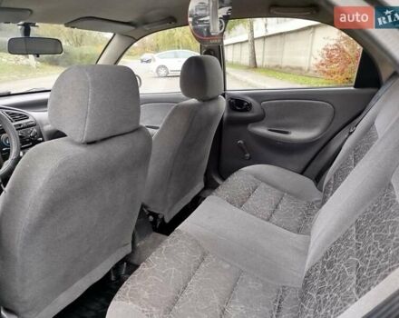 Черный Дэу Ланос, объемом двигателя 1.5 л и пробегом 351 тыс. км за 2000 $, фото 5 на Automoto.ua