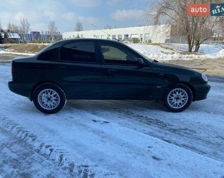 Чорний Деу Ланос, об'ємом двигуна 1.5 л та пробігом 231 тис. км за 2299 $, фото 2 на Automoto.ua
