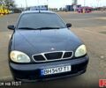 Черный Дэу Ланос, объемом двигателя 1.5 л и пробегом 98 тыс. км за 2700 $, фото 1 на Automoto.ua
