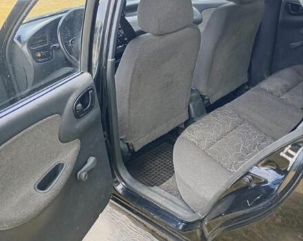 Черный Дэу Ланос, объемом двигателя 1.5 л и пробегом 171 тыс. км за 1600 $, фото 8 на Automoto.ua