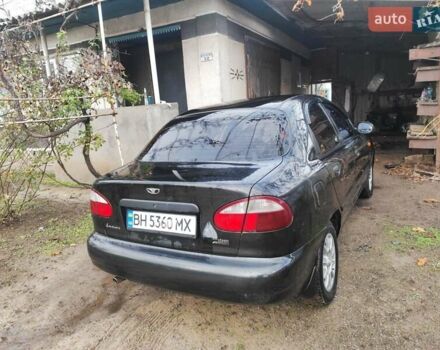 Черный Дэу Ланос, объемом двигателя 1.5 л и пробегом 130 тыс. км за 2700 $, фото 3 на Automoto.ua