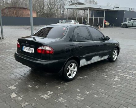 Черный Дэу Ланос, объемом двигателя 1.5 л и пробегом 161 тыс. км за 1950 $, фото 11 на Automoto.ua