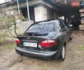 Черный Дэу Ланос, объемом двигателя 1.5 л и пробегом 130 тыс. км за 2700 $, фото 3 на Automoto.ua