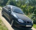 Черный Дэу Ланос, объемом двигателя 1.6 л и пробегом 156 тыс. км за 2300 $, фото 1 на Automoto.ua