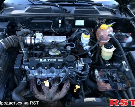 Черный Дэу Ланос, объемом двигателя 1.5 л и пробегом 368 тыс. км за 1150 $, фото 11 на Automoto.ua