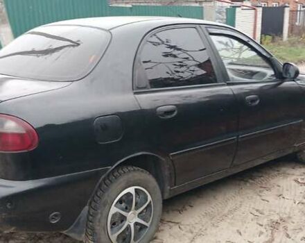 Чорний Деу Ланос, об'ємом двигуна 1.4 л та пробігом 180 тис. км за 1600 $, фото 3 на Automoto.ua