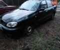 Черный Дэу Ланос, объемом двигателя 1.5 л и пробегом 156 тыс. км за 1000 $, фото 1 на Automoto.ua